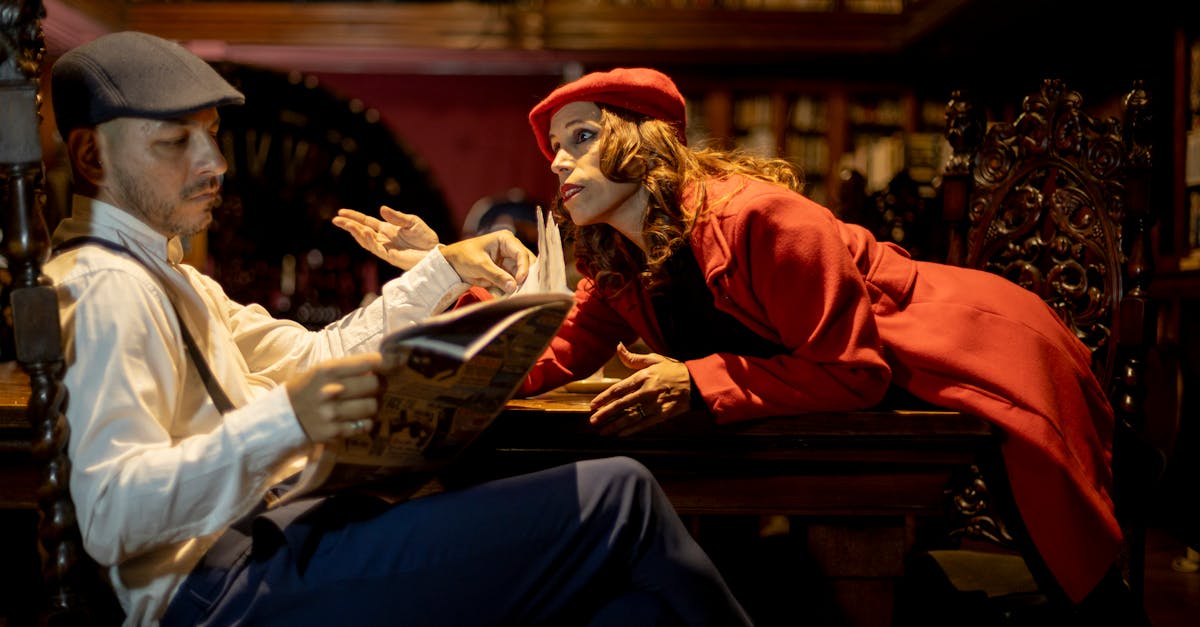 A couple engaged in a dramatic conversation in a vintage library setting in Buenos Aires.